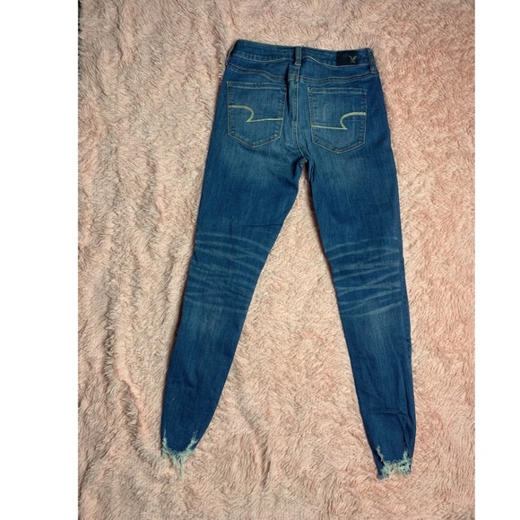 Distressed Mid Rise Jeans - Picture 6 of 6